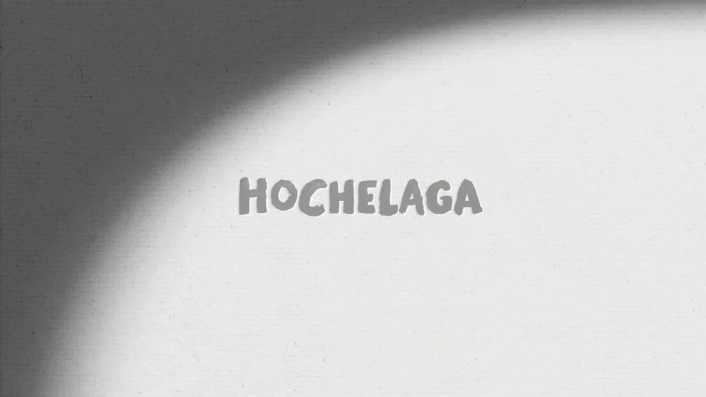 Image avec le mot "Hochelaga" écrit en lettres grises sur un fond texturé blanc avec une grande ombre diagonale projetée.